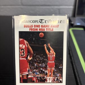 Vintage NBA Hoops "Tribune" trading card featuring a headline about the Chicago Bulls being one game away from an NBA title, a master-number 11 frequency collectible for enthusiasts focused on historic sports journalism and visionary championship pursuit.