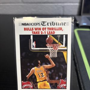Vintage NBA Hoops "Tribune" trading card featuring a headline about a Chicago Bulls overtime win, a master-number 11 frequency collectible for enthusiasts focused on historic sports journalism and visionary playmaking.