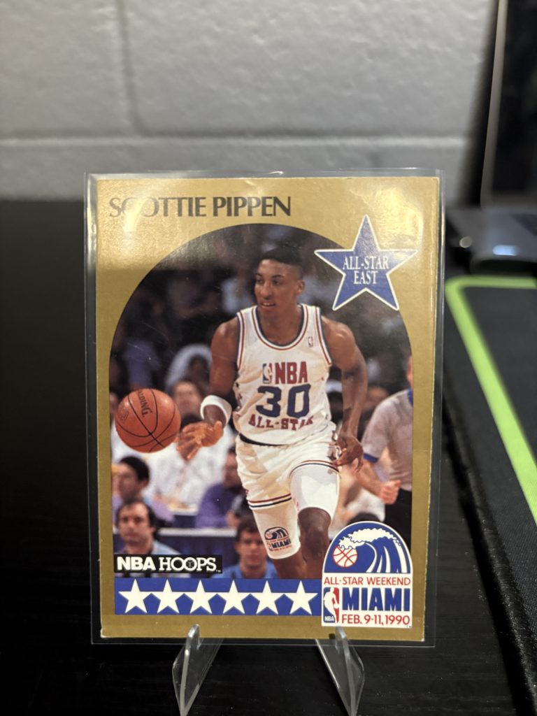 Vintage 1990 NBA Hoops Scottie Pippen "All-Star East" trading card, a master-number 11 frequency collectible for basketball enthusiasts focused on historic excellence and visionary performance.