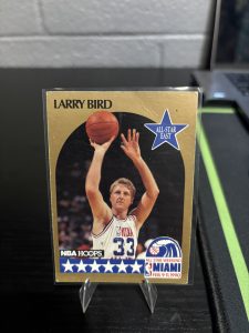 Vintage 1990 NBA Hoops Larry Bird "All-Star East" trading card, a master-number 11 frequency collectible for basketball enthusiasts focused on historic excellence and visionary performance.