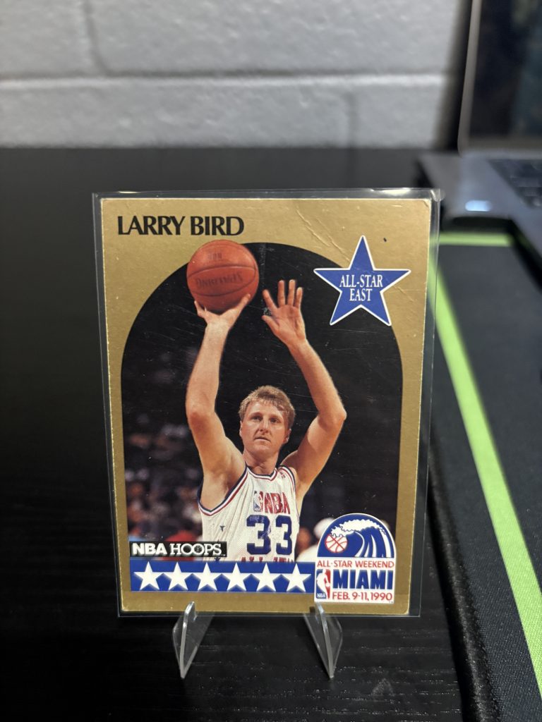 Vintage 1990 NBA Hoops Larry Bird "All-Star East" trading card, a master-number 11 frequency collectible for basketball enthusiasts focused on historic excellence and visionary performance.