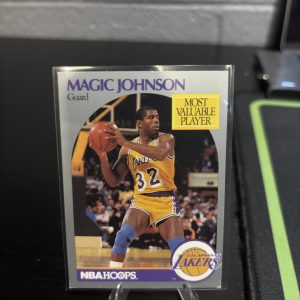 Vintage 1990-91 NBA Hoops Magic Johnson "Most Valuable Player" trading card, a master-number 11 frequency collectible for basketball enthusiasts focused on vision and leadership.