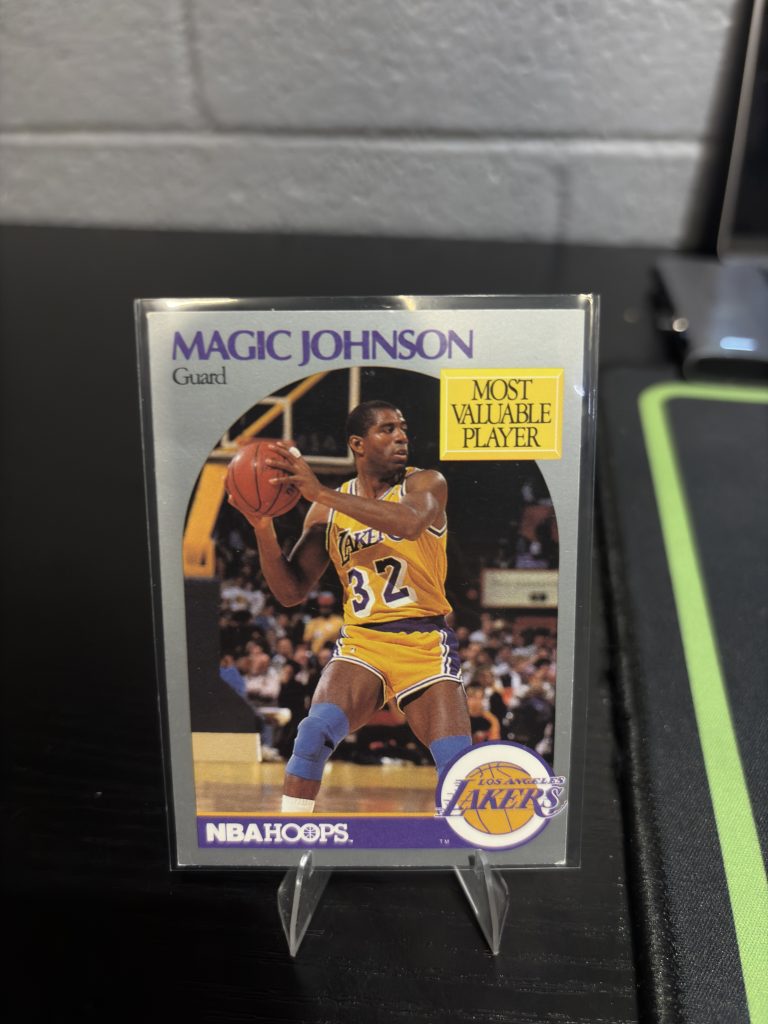 Vintage 1990-91 NBA Hoops Magic Johnson "Most Valuable Player" trading card, a master-number 11 frequency collectible for basketball enthusiasts focused on vision and leadership.