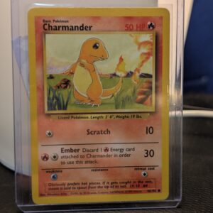 Vintage Unlimited Base Set Charmander Pokémon trading card number 46 out of 102, displayed inside a clear protective plastic toploader sleeve.