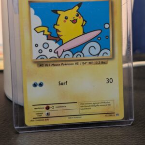 Surfing Pikachu Pokémon trading card, number 111/108 from the 2016 XY Evolutions expansion set, displayed in a clear protective plastic sleeve.