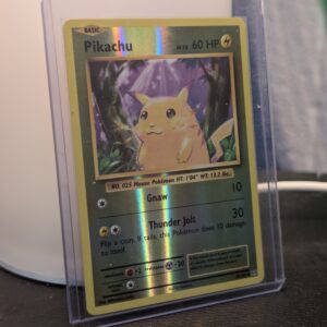 Reverse holographic Pikachu Pokémon trading card, number 35/108 from the 2016 XY Evolutions expansion set, displayed in a clear protective plastic sleeve.