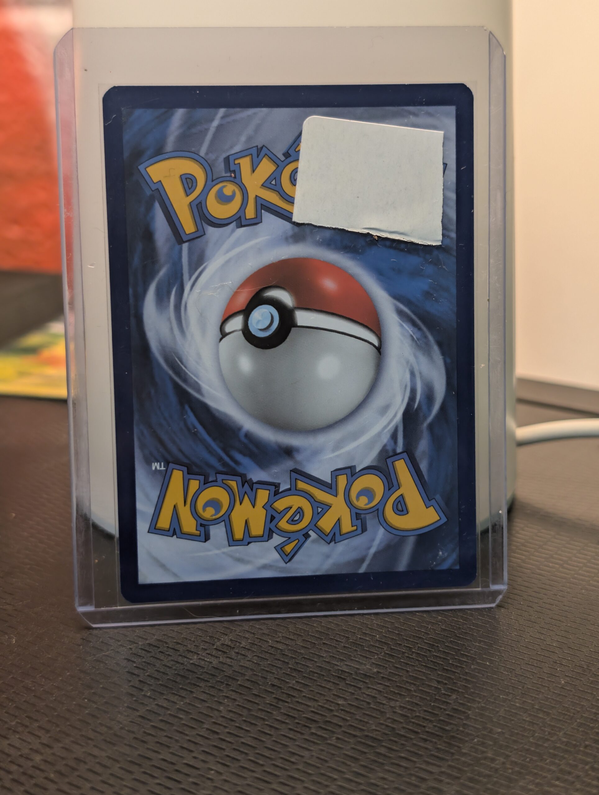 Reverse holographic Pikachu Pokémon trading card, number 35/108 from the 2016 XY Evolutions expansion set, displayed in a clear protective plastic sleeve.