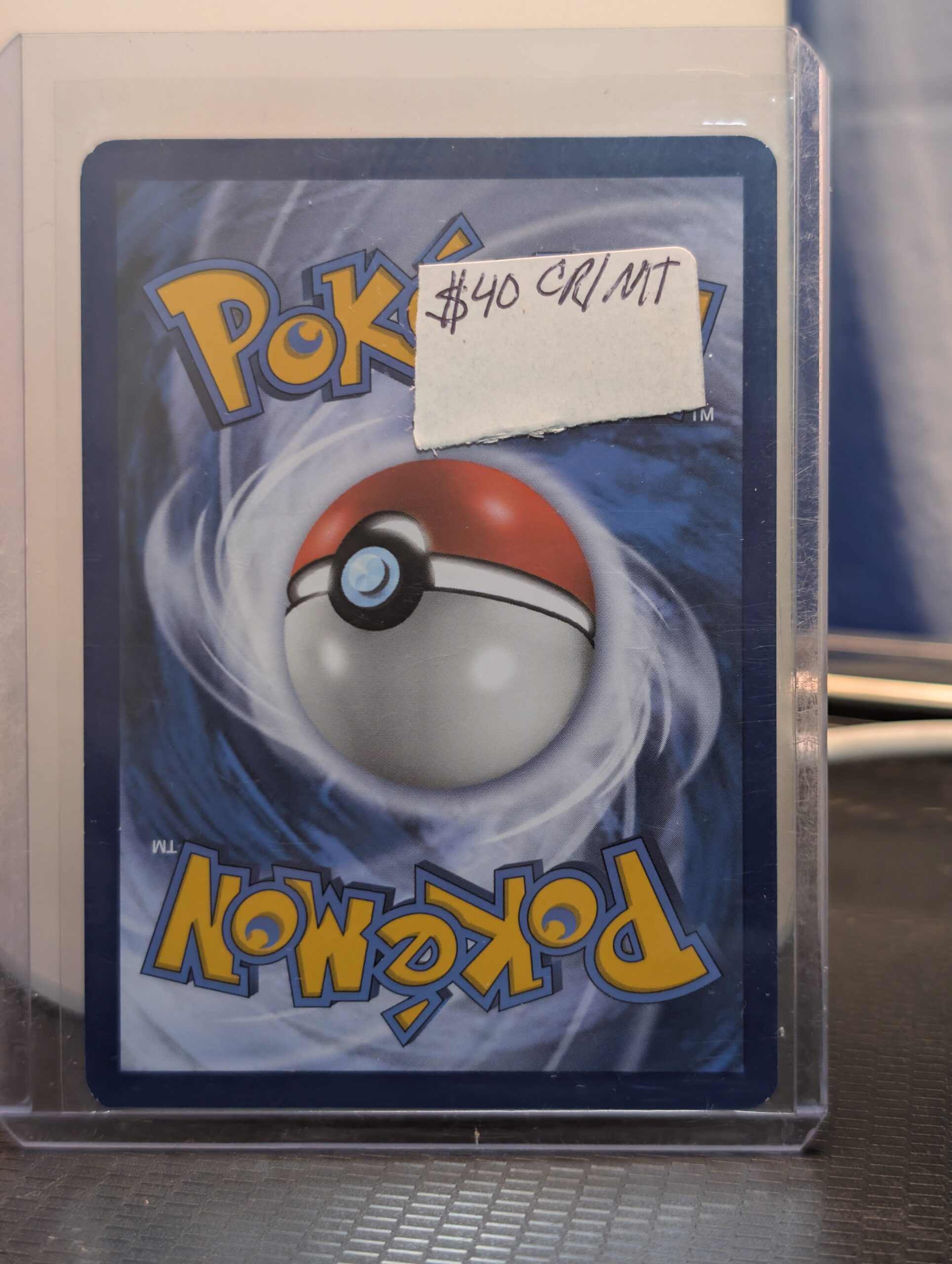 Holographic Pikachu Pokémon trading card, number 28/73 from the 2017 Shining Legends expansion, featuring the exclusive Cosmos holofoil pattern, displayed in a clear protective plastic sleeve.