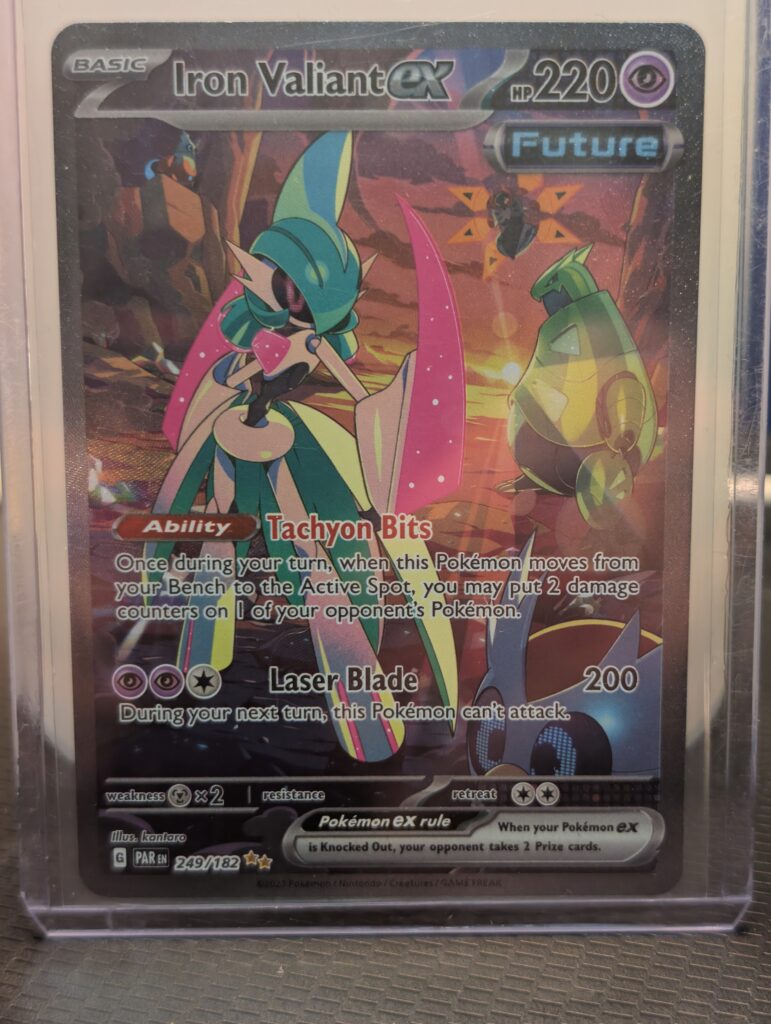 Holographic Iron Valiant ex Pokémon trading card, number 249/182 from the Paradox Rift expansion, featuring Special Illustration Rare artwork, displayed in a clear protective plastic sleeve.