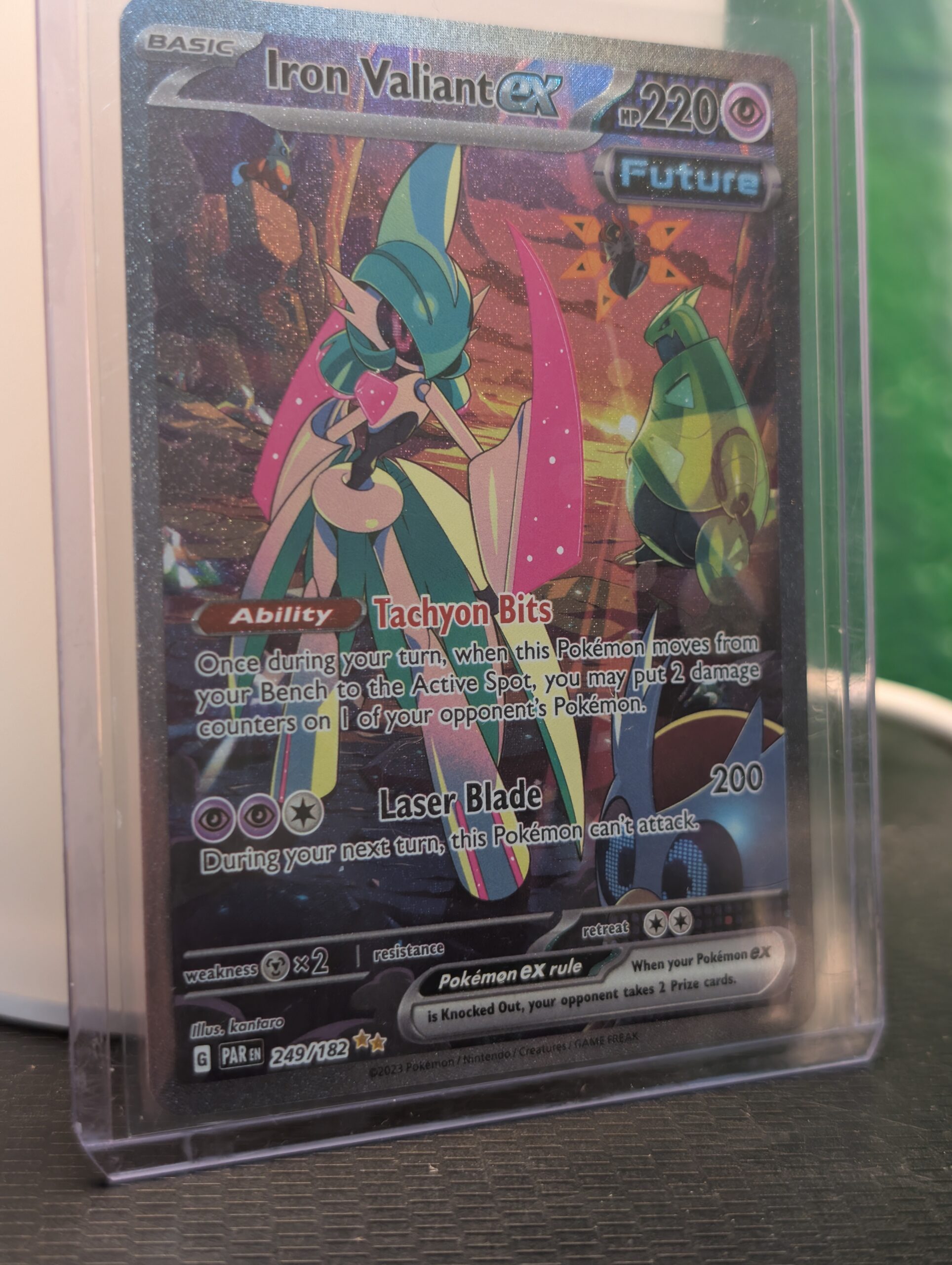 Holographic Iron Valiant ex Pokémon trading card, number 249/182 from the Paradox Rift expansion, featuring Special Illustration Rare artwork, displayed in a clear protective plastic sleeve.