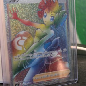 Stunning Japanese Phoebe Hyper Rare holographic trading card showing vibrant rainbow foil artwork of character inside clear protective display plastic sleeve against soft lighting for premium online listing