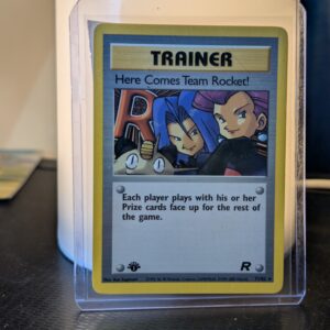 Authentic non holographic vintage Pokemon trading card displaying iconic Jessie James Meowth artwork inside protective plastic sleeve perfect for high tier search optimization tracking on live retail channels