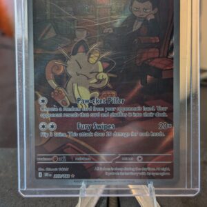 Stunning authentic Team Rocket Meowth illustration rare holographic modern trading card from Destined Rivals expansion safely displayed inside clear protective plastic sleeve for premium retail collection upgrades today.