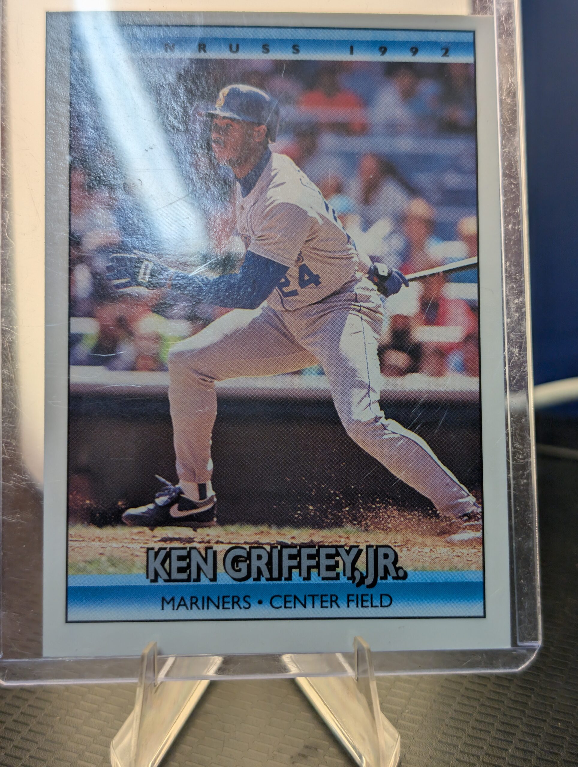 Authentic 1992 Donruss Ken Griffey Jr Seattle Mariners vintage baseball card displaying classic batting stance inside a clear protective plastic sleeve perfectly capturing ultimate sports history.