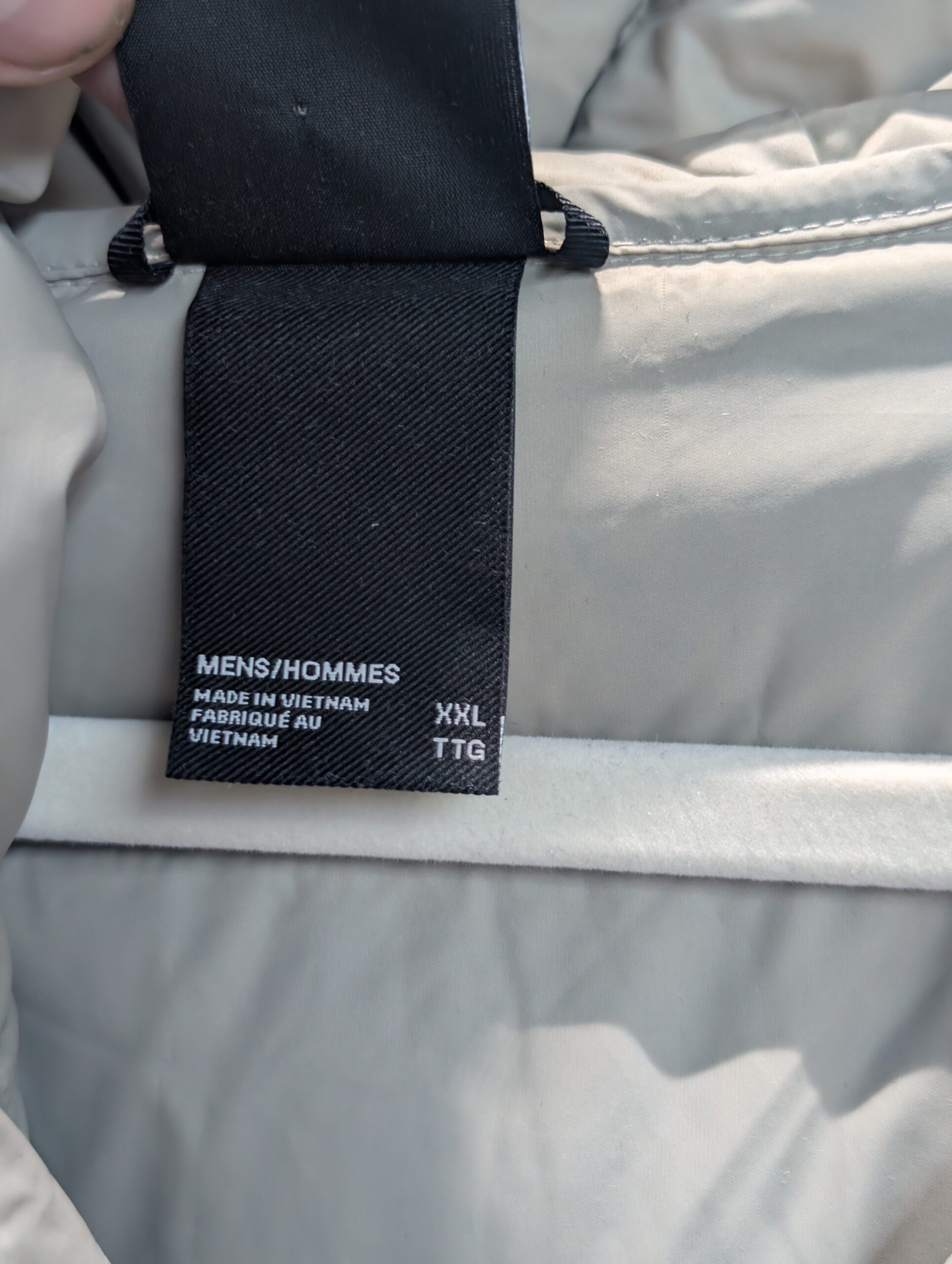 Front view of The North Face Mens Hydrenalite Hoodie in Clay Grey showing the recycled down puffy design and logo.