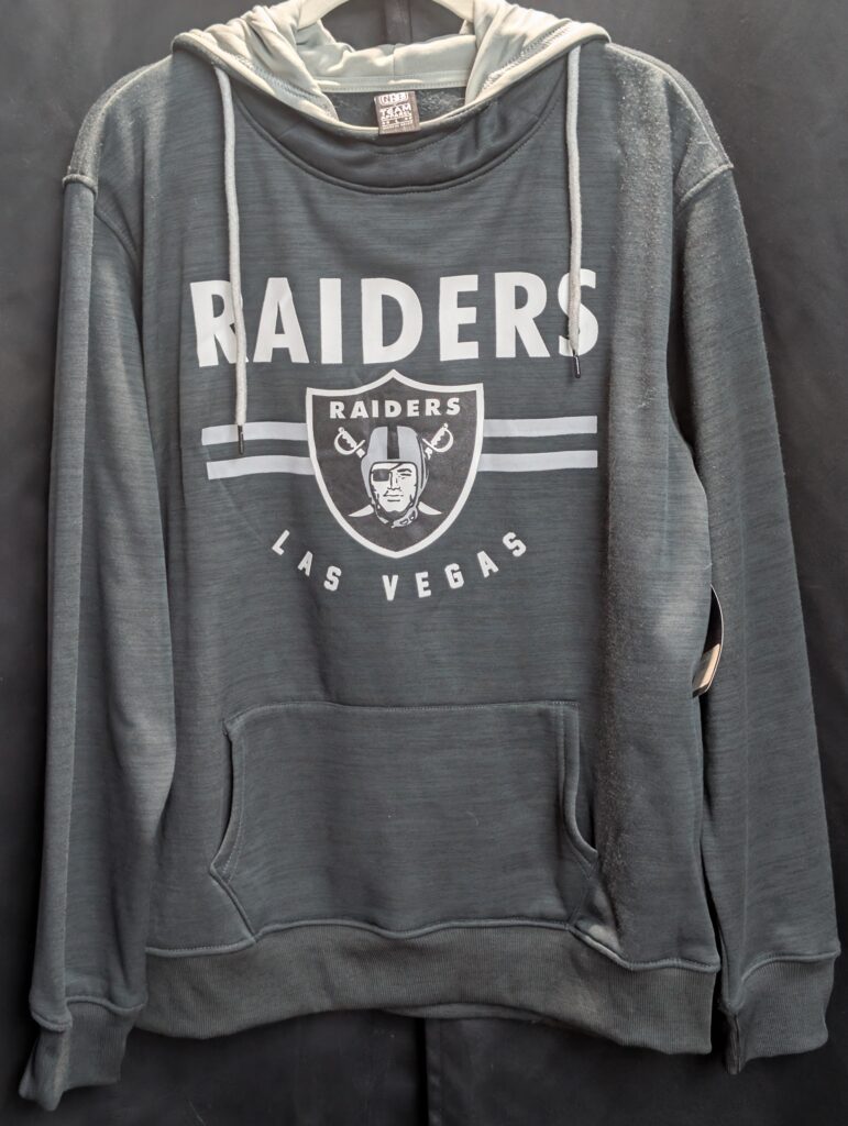 Brand new with tags official NFL Team Apparel size large Las Vegas Raiders heathered black pullover hoodie featuring classic team shield logo and convenient front kangaroo pocket today.