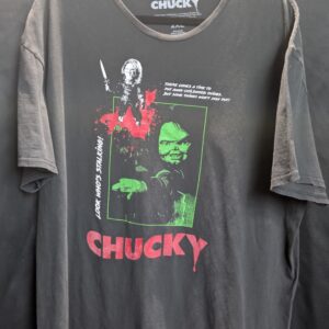 Authentic size two extra large black short sleeve graphic shirt featuring classic Chucky horror movie character holding a knife with green and red vintage distressed print details.
