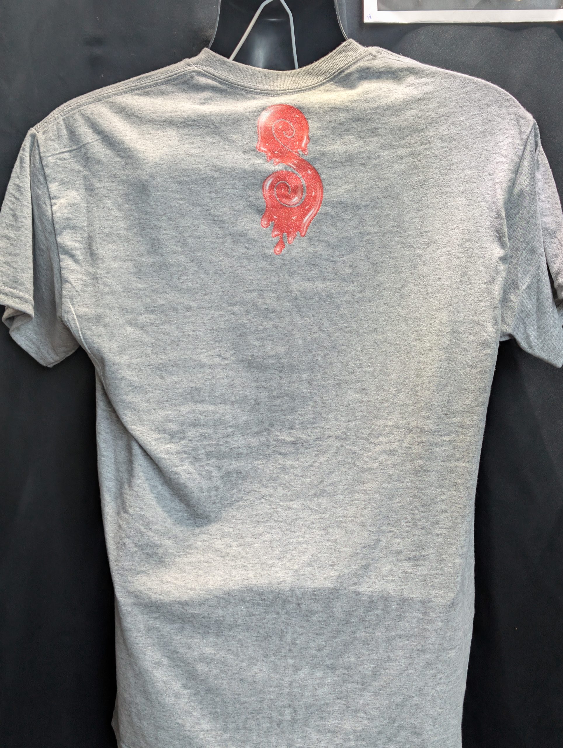 Grey shirt featuring pink yellow Sticky Queens logo.