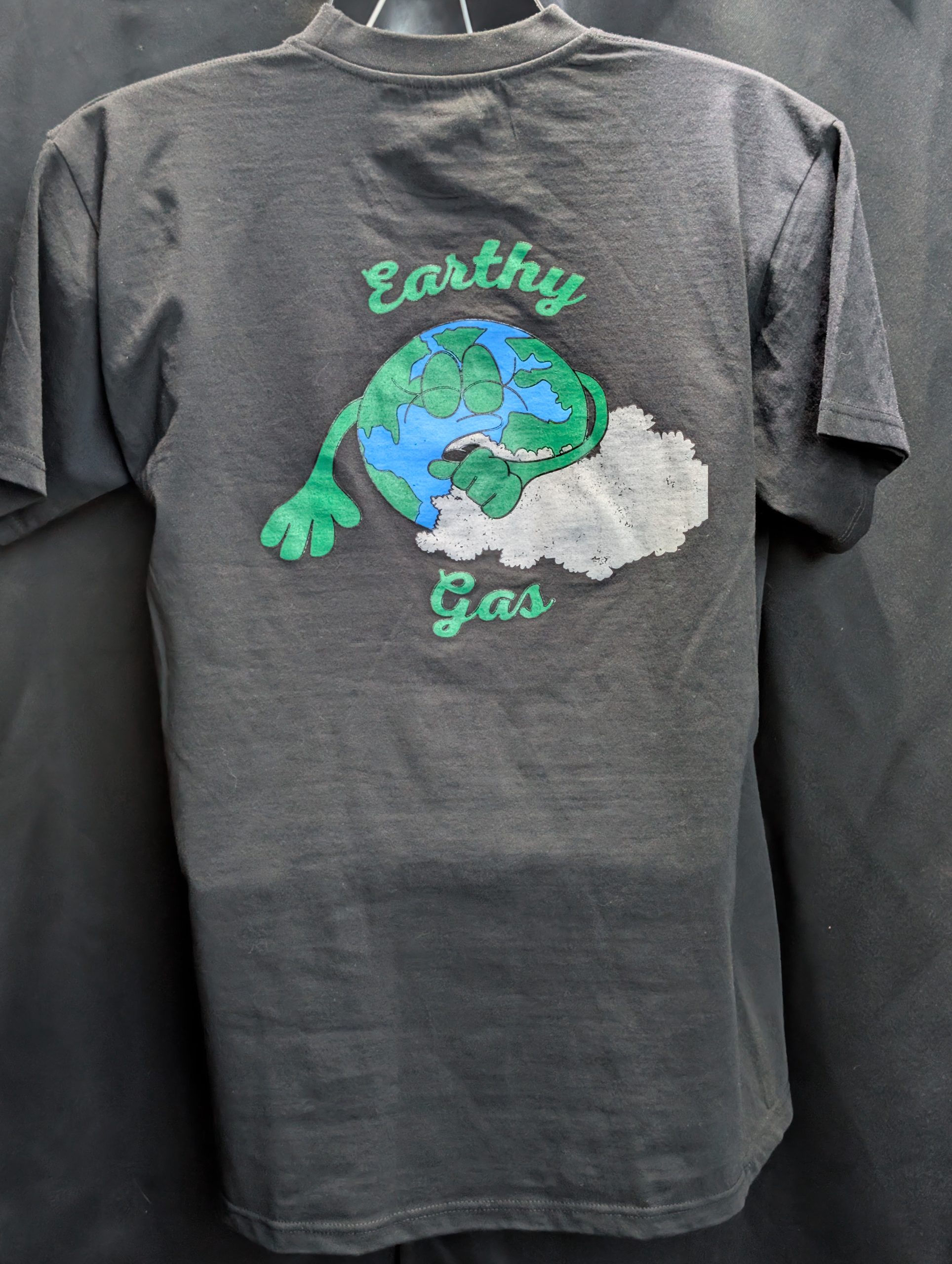 Black shirt featuring Earthy Gas smoking globe graphic.