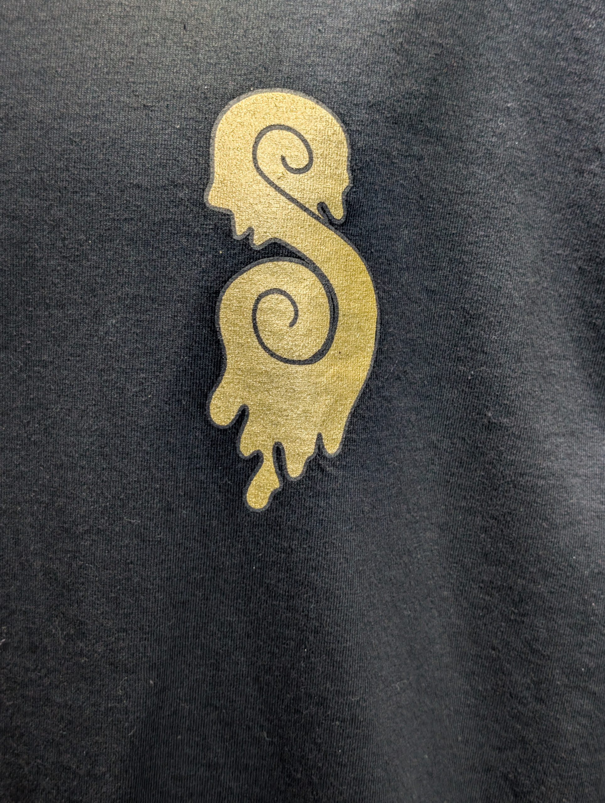Black shirt featuring gold Rollers Hall of Fame.