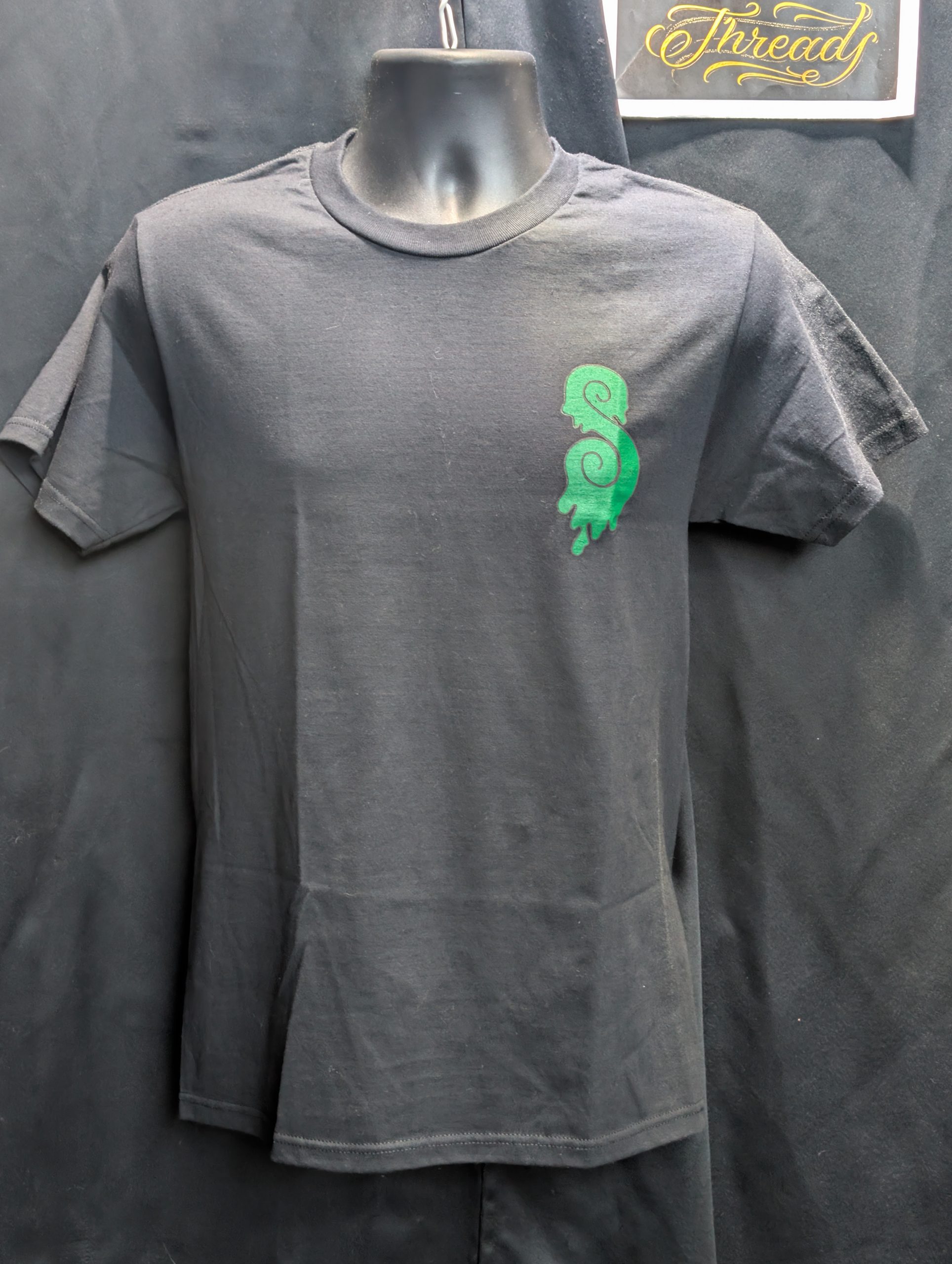 Black shirt featuring Earthy Gas smoking globe graphic.