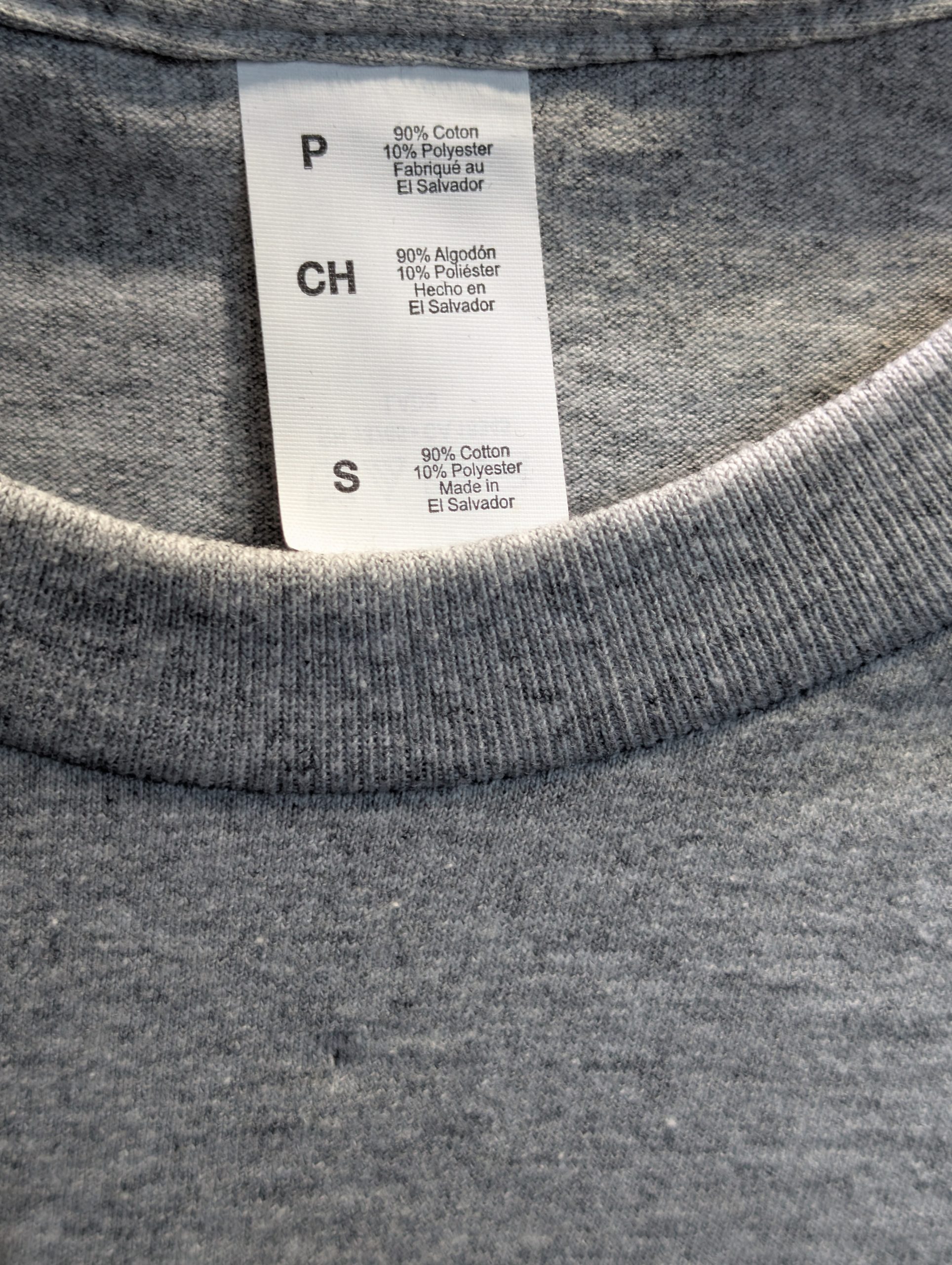 Grey shirt featuring purple yellow Sticky Canna logo tag size small