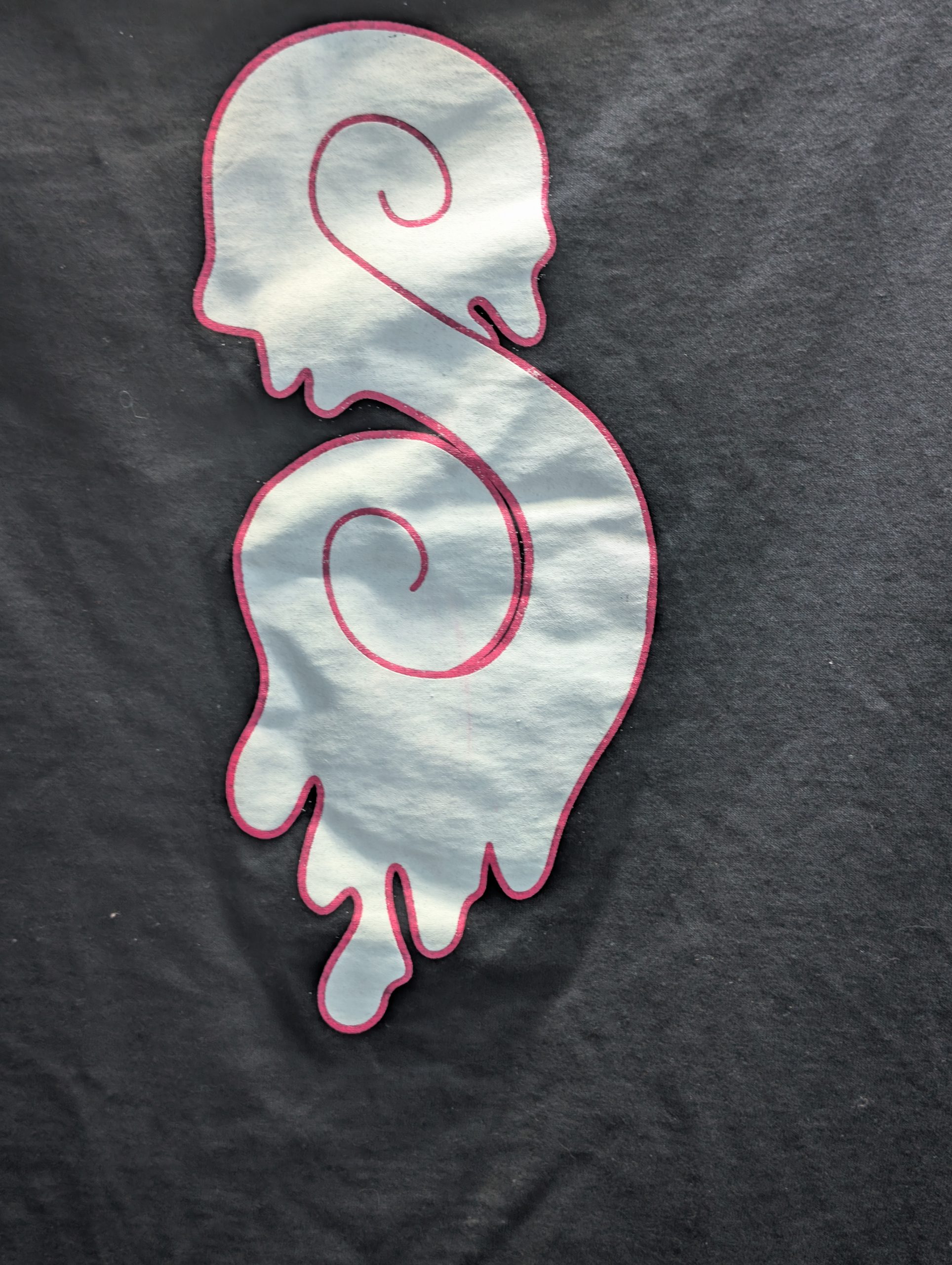 Black shirt featuring hot pink Sticky Canna logo.