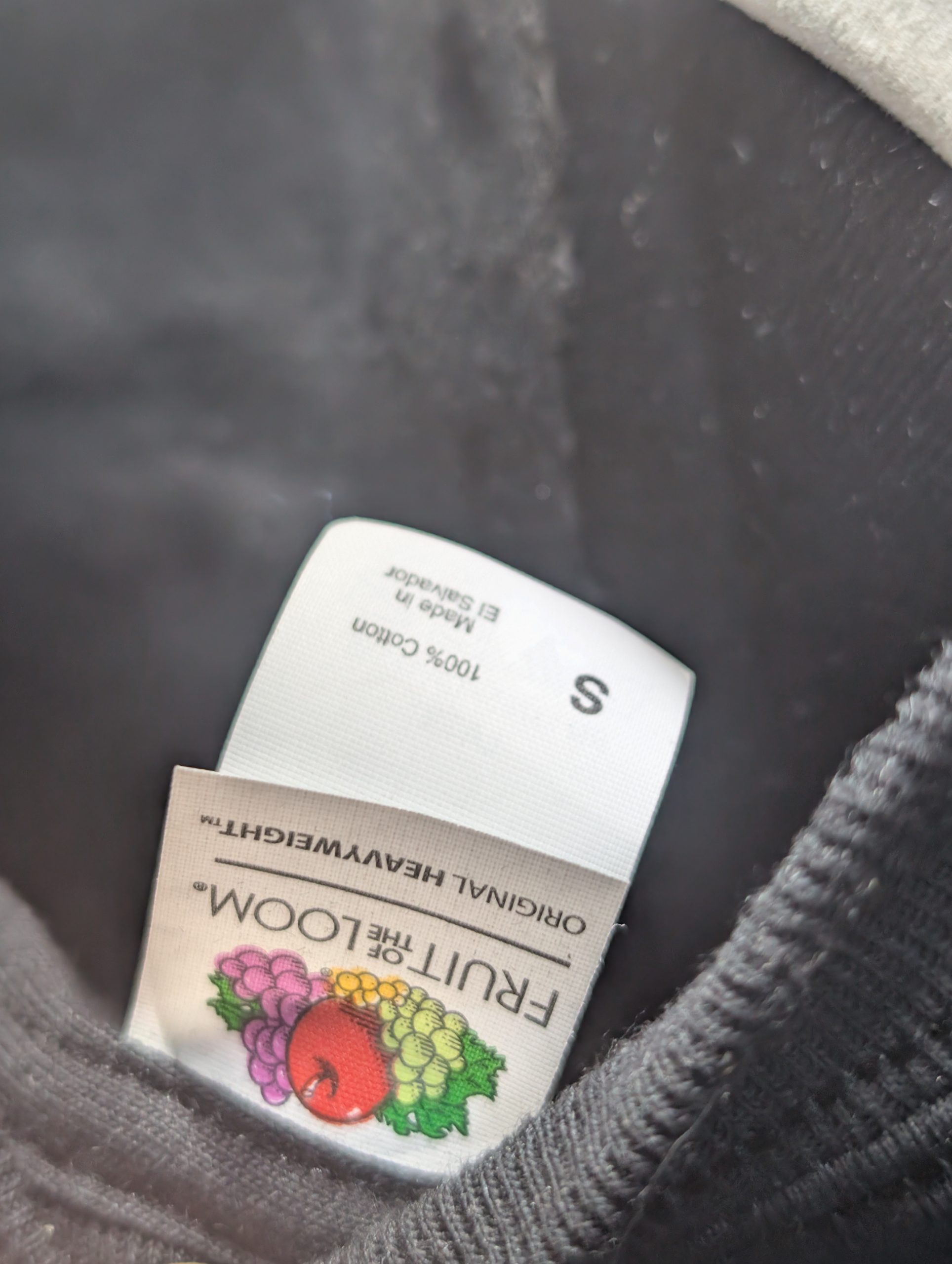 Black shirt featuring hot pink Sticky Canna logo Tag.