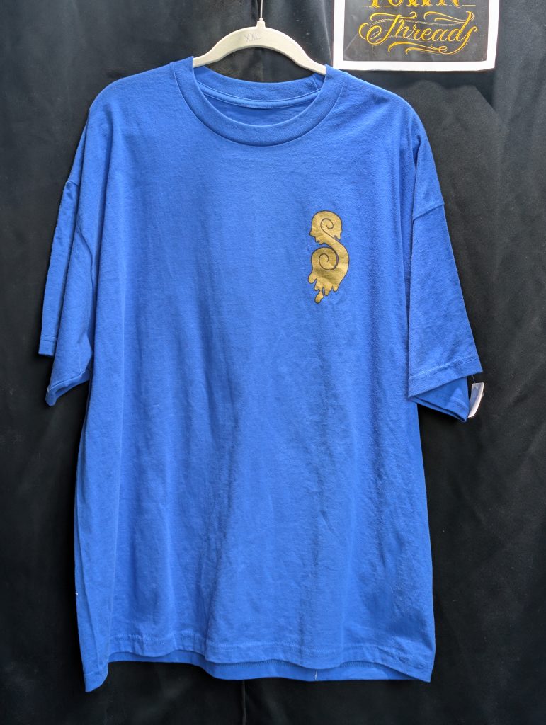 Blue shirt featuring gold Rollers Hall of Fame.