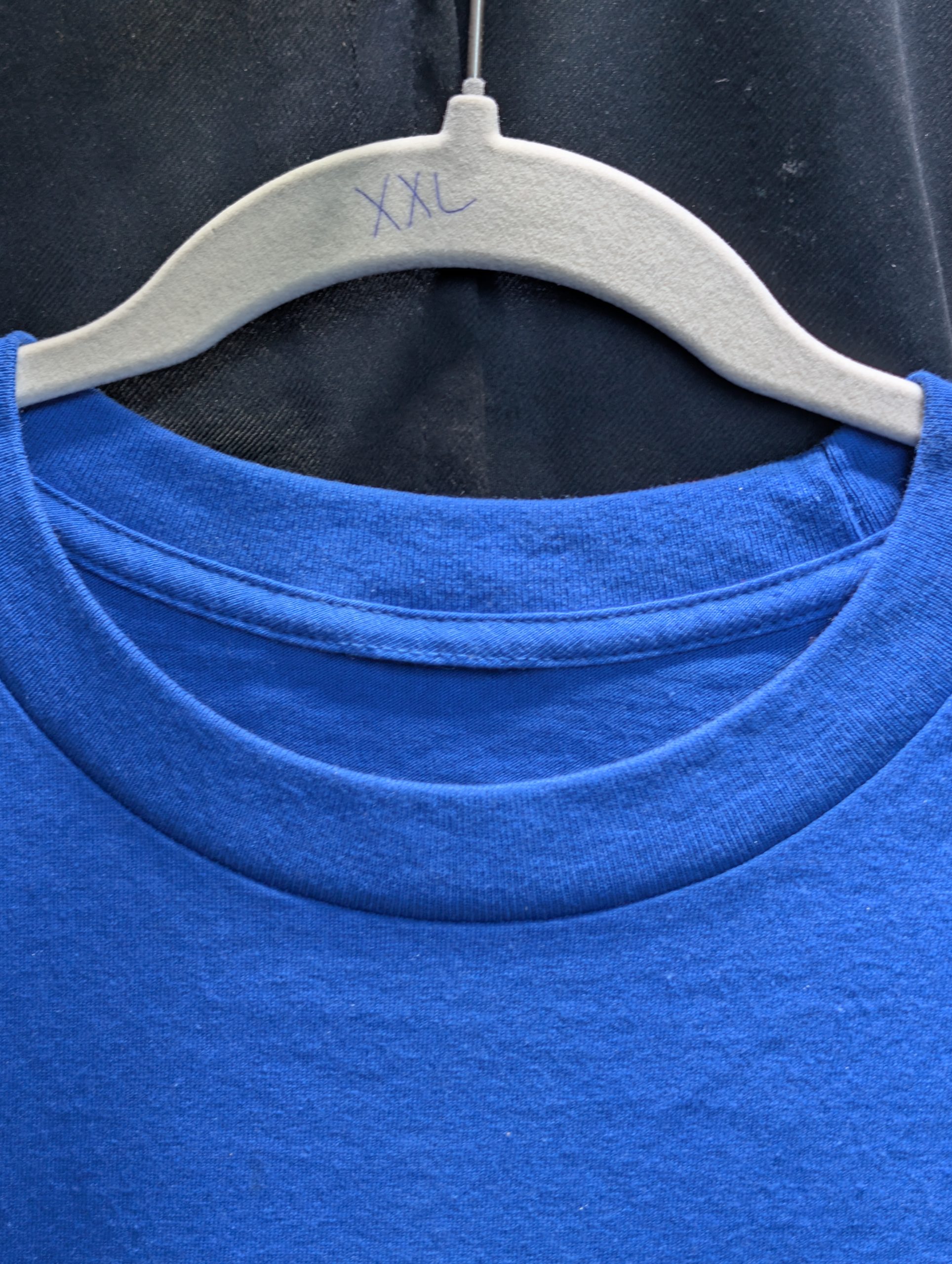 Blue shirt featuring gold Rollers Hall of Fame Tag XXL.