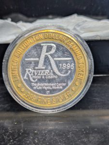 Vintage 1996 Riviera Hotel & Casino limited edition $10 silver gaming token featuring Jeff Kutash's Splash, a high-vibration collectible perfect for aligning with the number 28 frequency for ultimate business success and wealth manifestation.