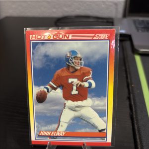 Vintage Score "Hot Gun" John Elway Denver Broncos football trading card, a high-frequency collectible incorporated for your business success.
