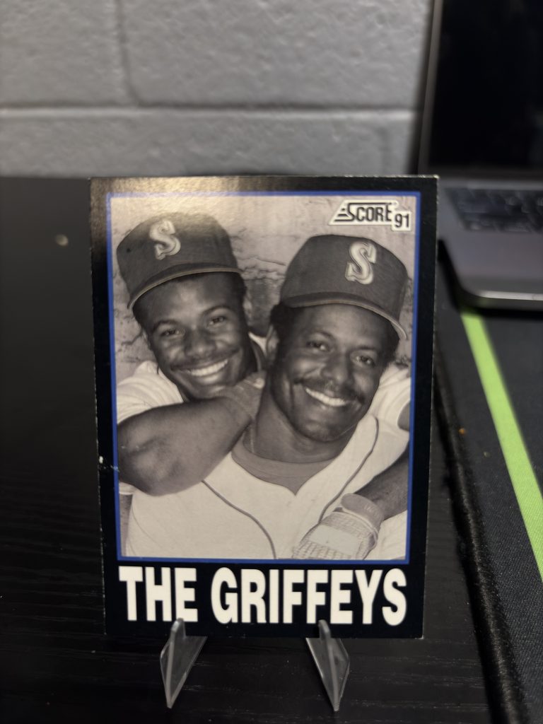 Vintage 1991 Score baseball trading card titled 'The Griffeys' featuring Ken Griffey Jr. and Ken Griffey Sr., a high-frequency collectible incorporated for your business success.