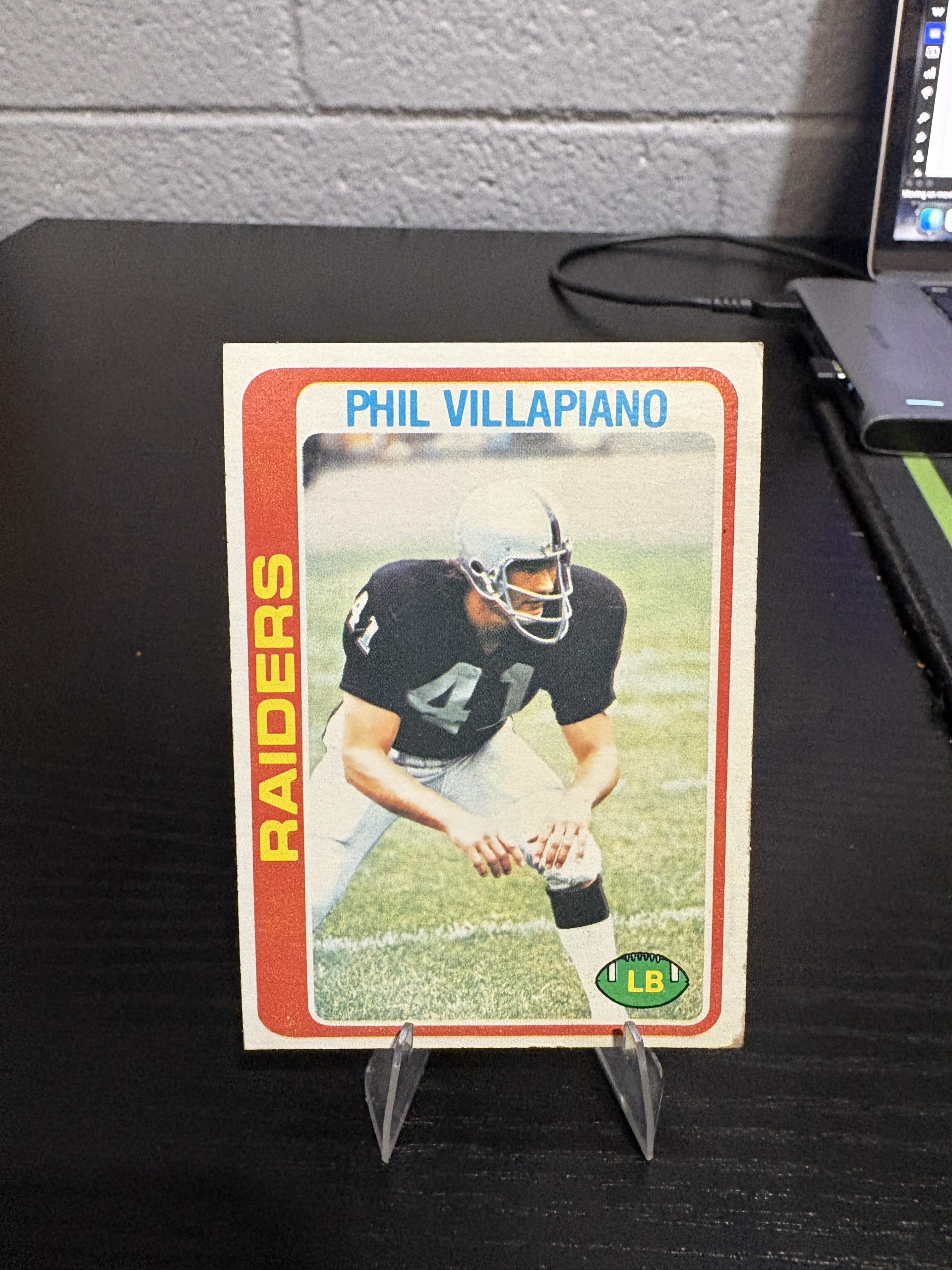 Vintage Phil Villapiano Oakland Raiders football trading card, a high-frequency collectible incorporated for your business success.