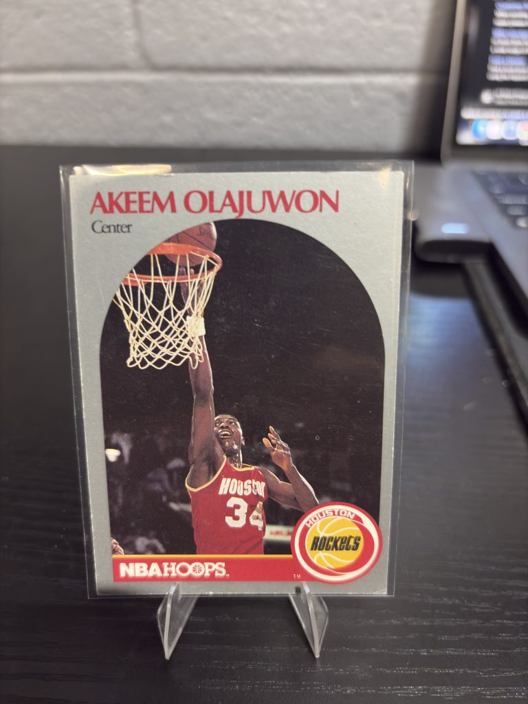 Vintage NBA Hoops Akeem Olajuwon Houston Rockets basketball trading card, a high-frequency collectible incorporated for your business success.