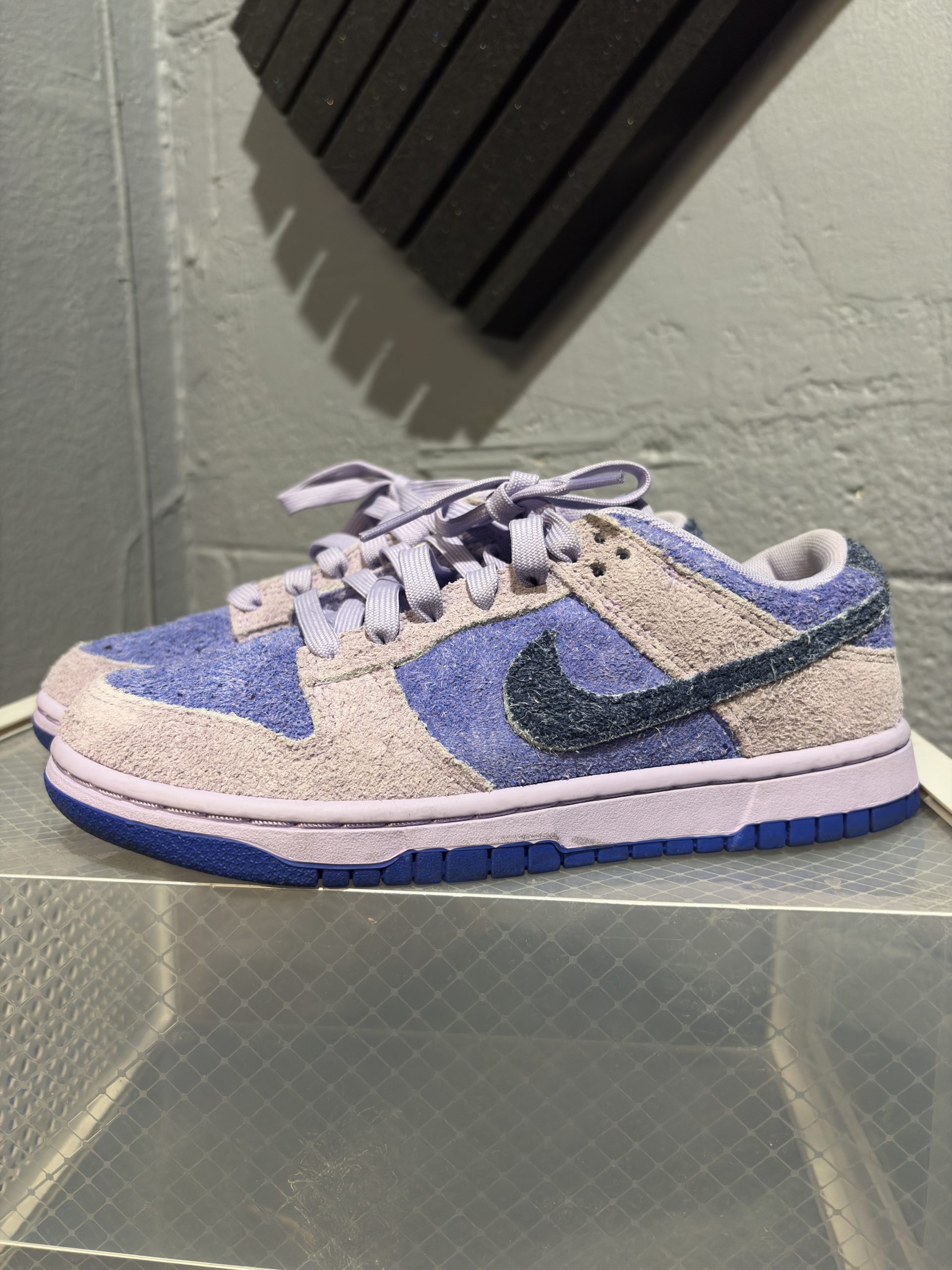 Nike Dunk Low purple suede sneakers, a high-frequency footwear item incorporated for your business success.