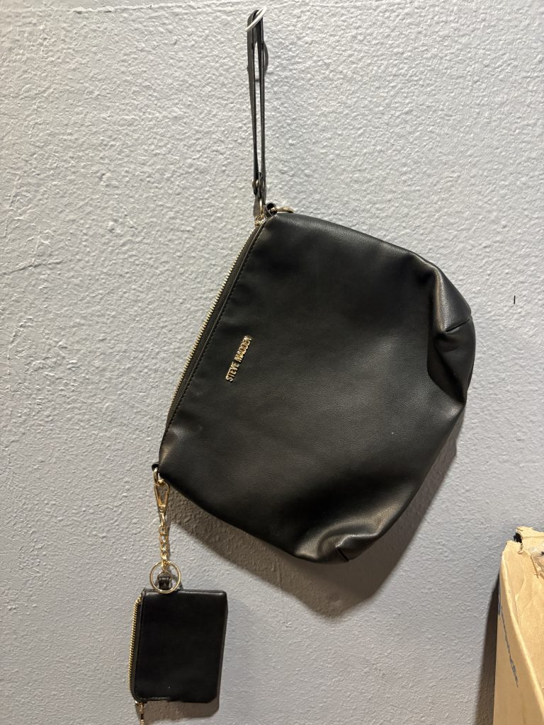 : Steve Madden black wristlet pouch with matching detachable card case and gold hardware.