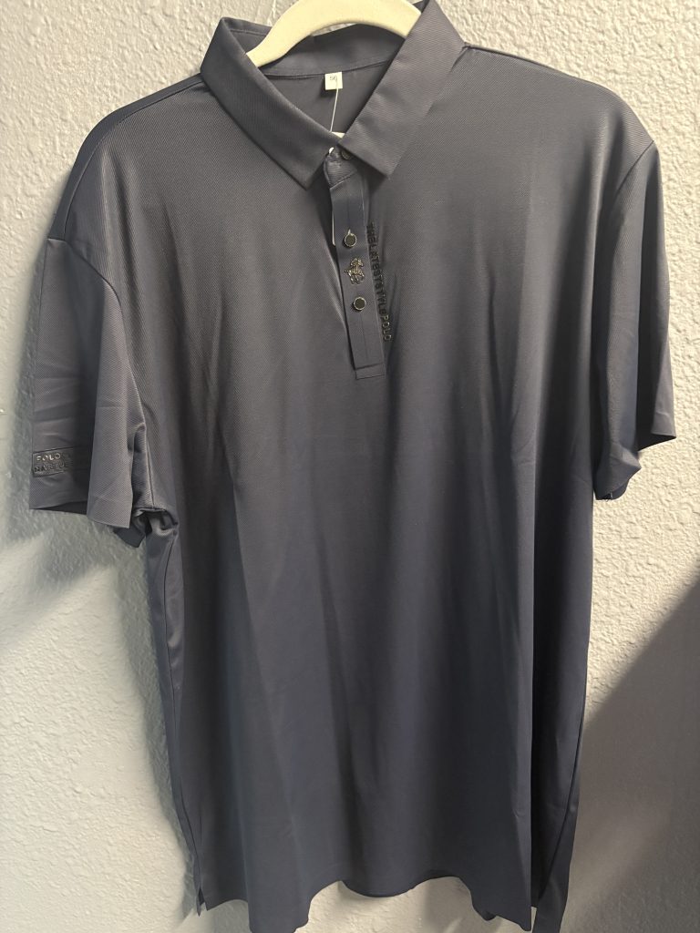 Premium navy blue polo shirt featuring embroidered equestrian logo and "THELATESTSTYLEPOLO" text on the placket.