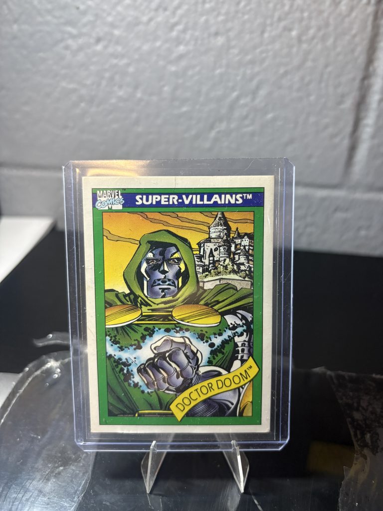1990 Marvel Universe Doctor Doom trading card #60, Super-Villains series, featuring comic art in a protective case.