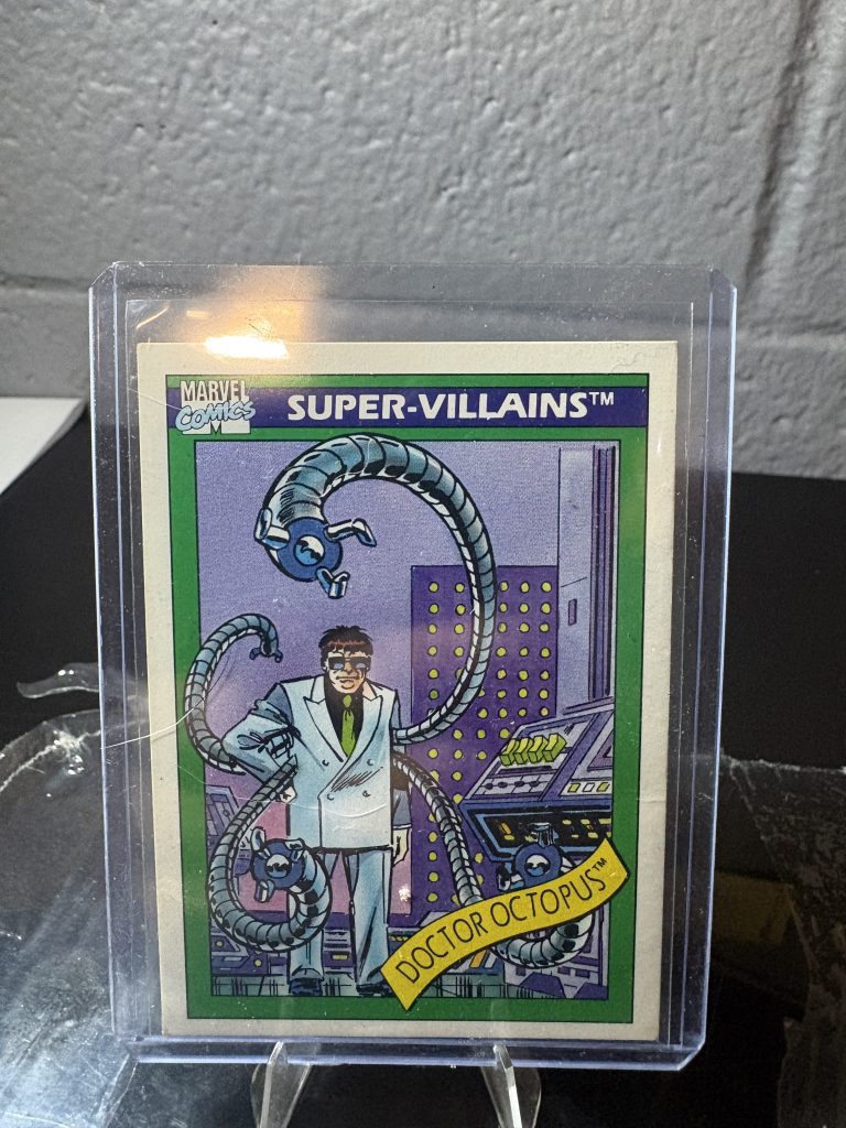 1990 Marvel Universe Doctor Octopus trading card #59, Super-Villains series, featuring comic art in a protective case.