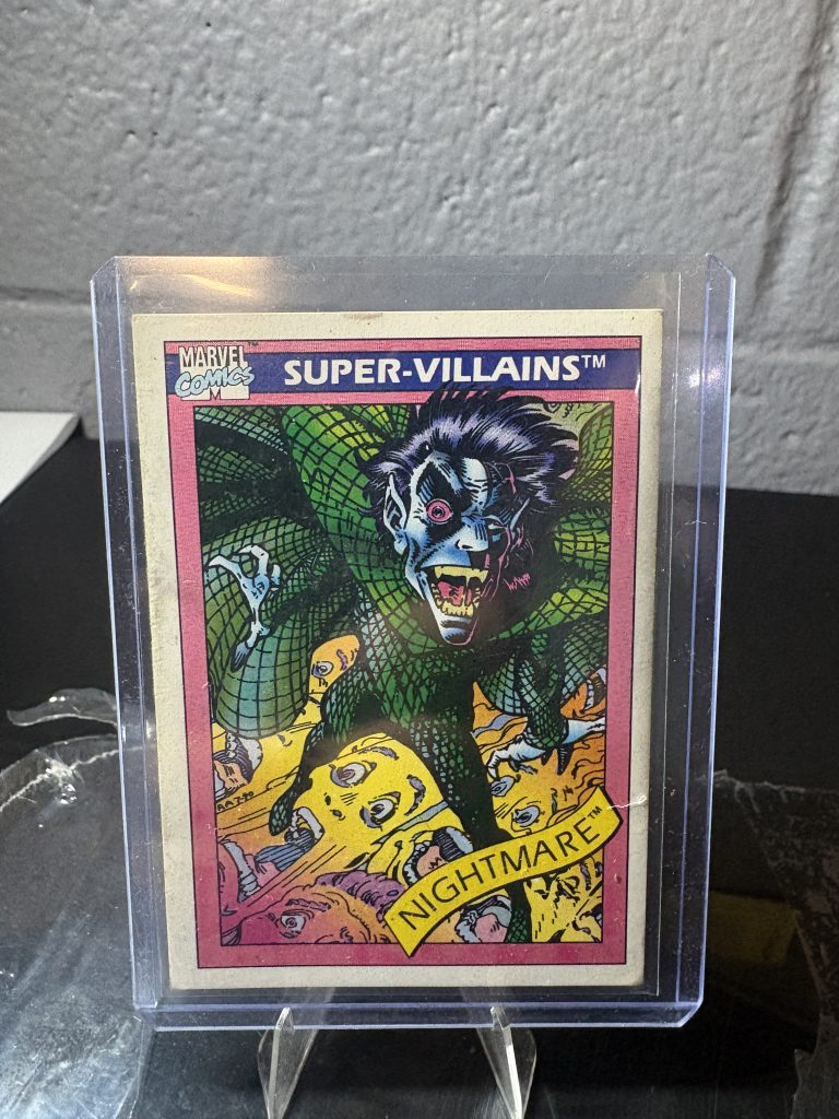 1990 Marvel Universe Nightmare trading card #56, Super-Villains series, featuring comic art in a protective case.