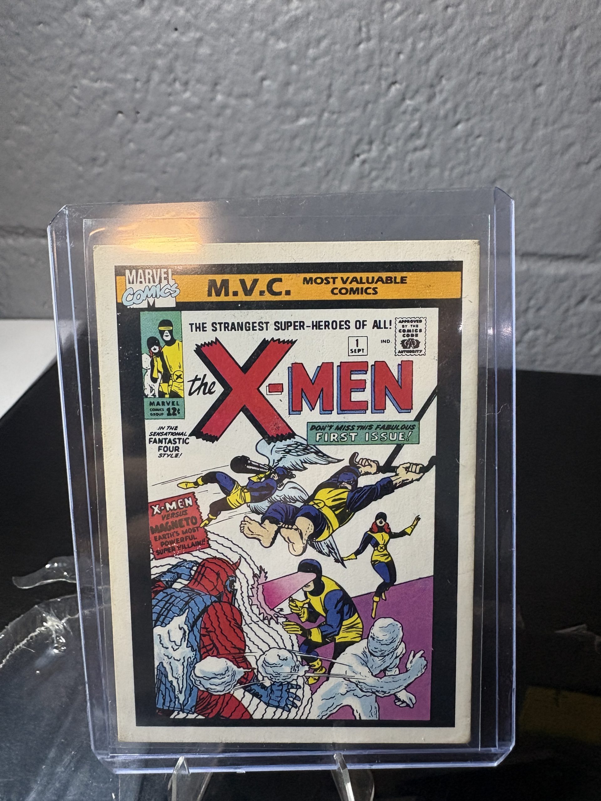 1990 Marvel Universe X-Men #1 trading card #125, Most Valuable Comics series, featuring classic comic cover art in a protective case.