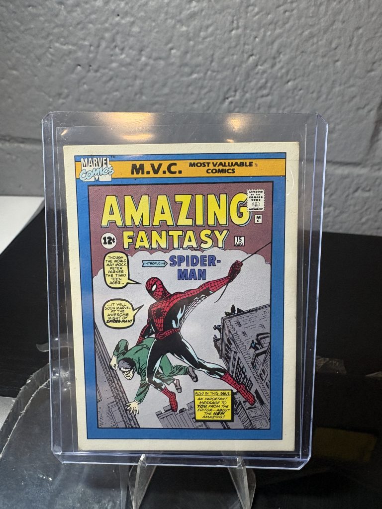 1990 Marvel Universe Amazing Fantasy #15 trading card #126, Most Valuable Comics series, featuring the debut of Spider-Man in a protective case.