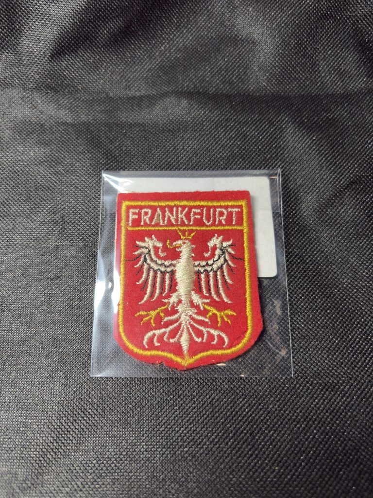 Embroidered Frankfurt city crest patch with eagle emblem, in a protective sleeve.