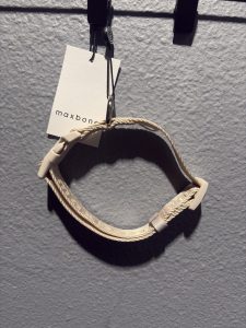 Maxbone designer pet collar in beige featuring repeating brand lettering, a quick-release buckle, and hang tag.
