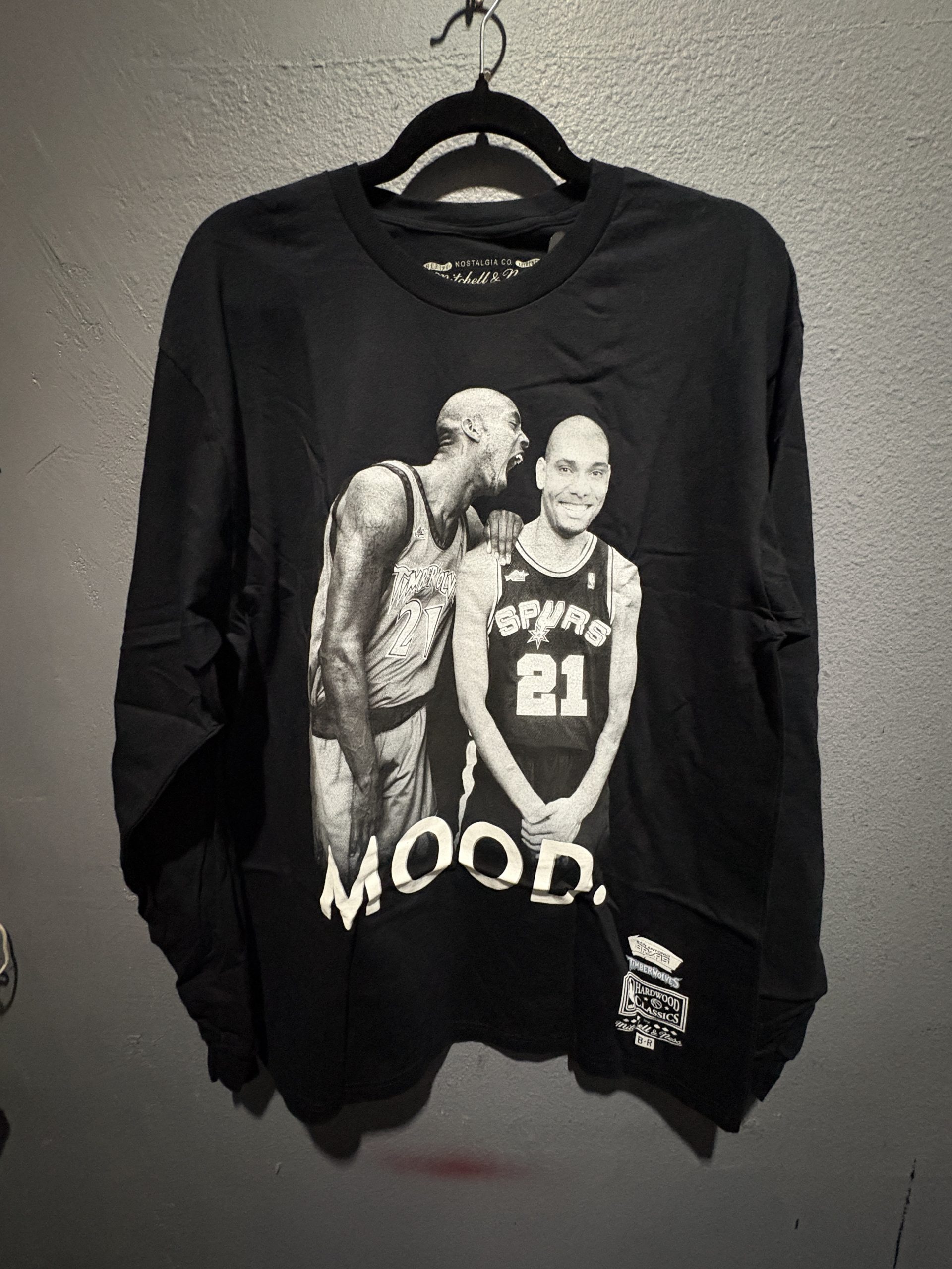Mitchell & Ness Bleacher Report NBA Remix San Antonio Spurs Mood long sleeve t-shirt in black showing the front graphic and hanging tags in size L.