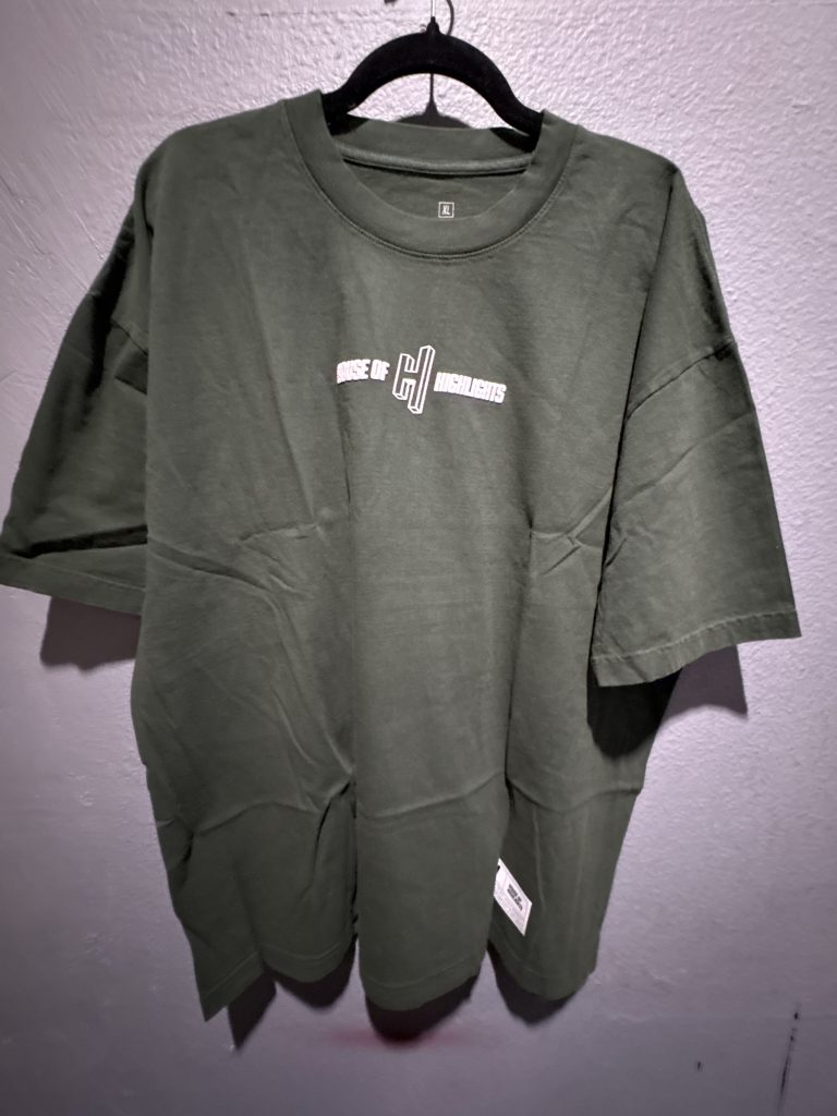 House of Highlights optical illusion H logo graphic t-shirt in olive green showing the front chest design, back logo, and size XL tag.
