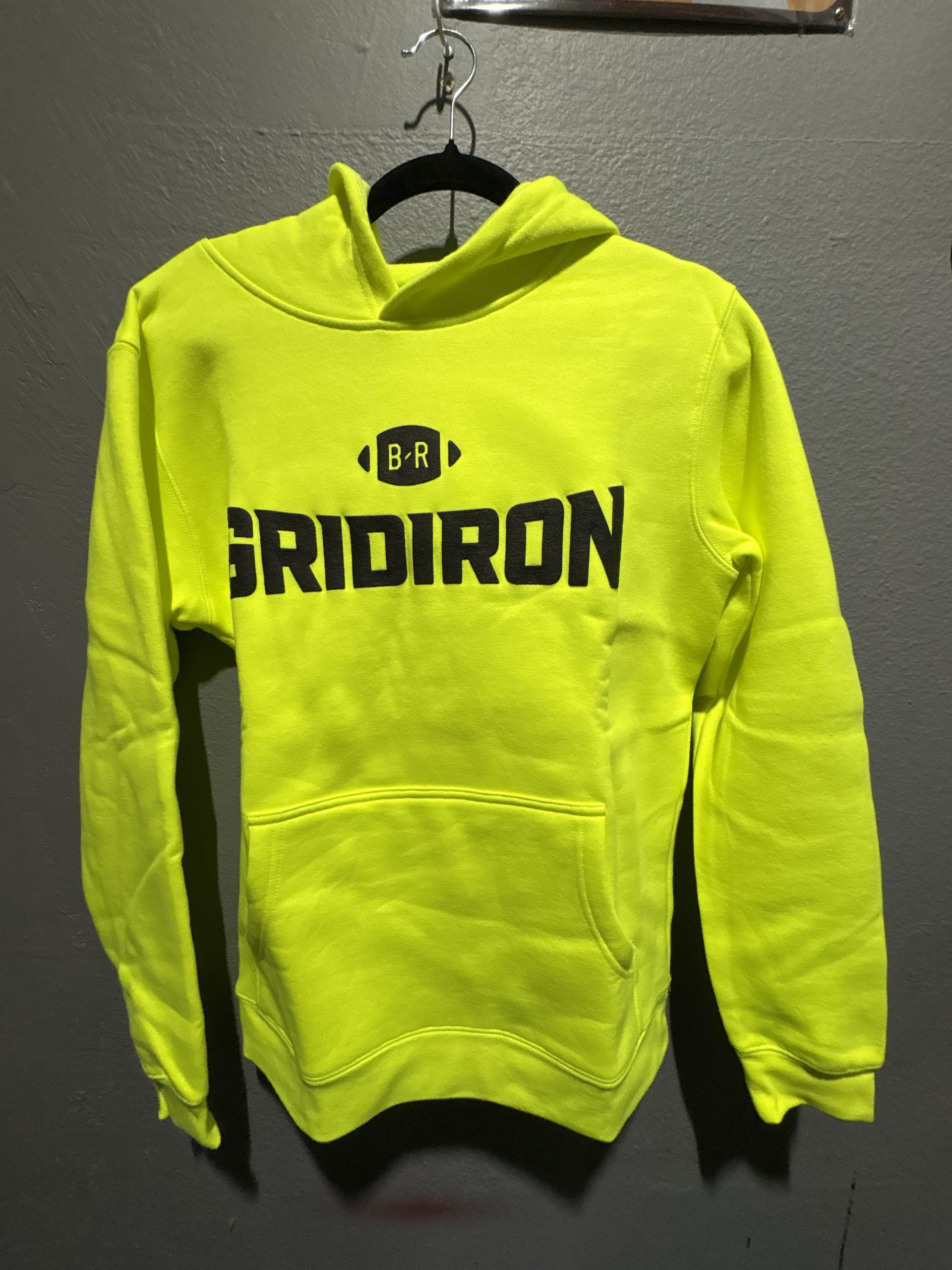 Bleacher Report Gridiron graphic hoodie in neon yellow showing the front chest logo and size S tag.